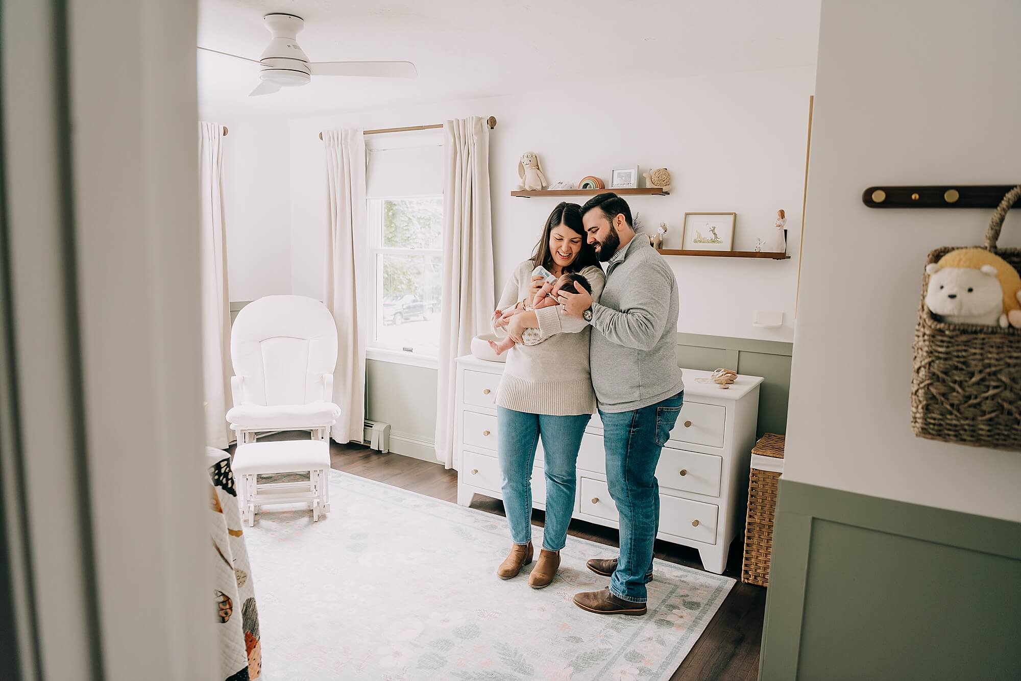 Massachusetts family snuggles their baby during their session with Boston Newborn Photographer, Allison Wolf