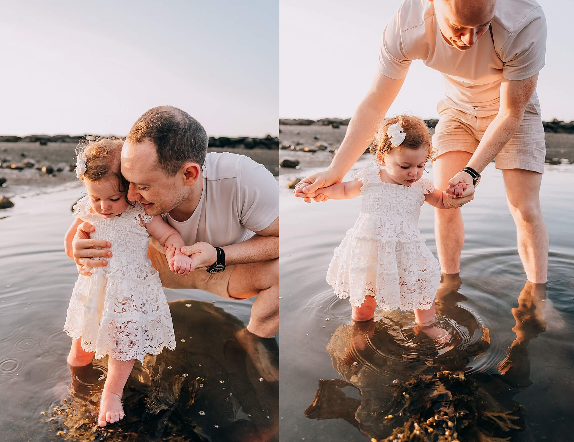 Dad holds his toddler while playing in the water at the oceanside