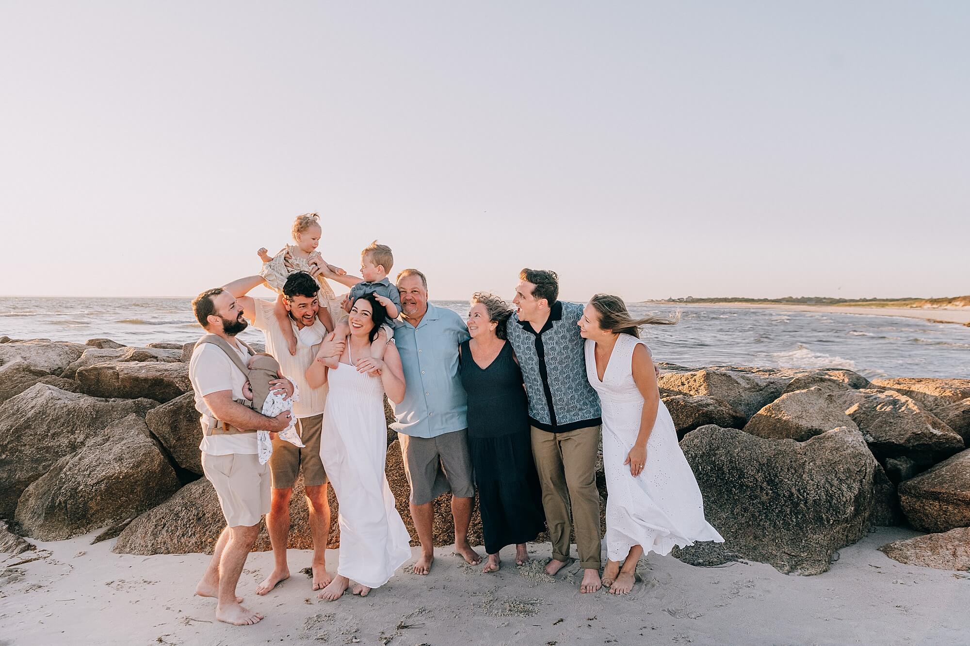 A family has fun together at a beach in Falmouth MA