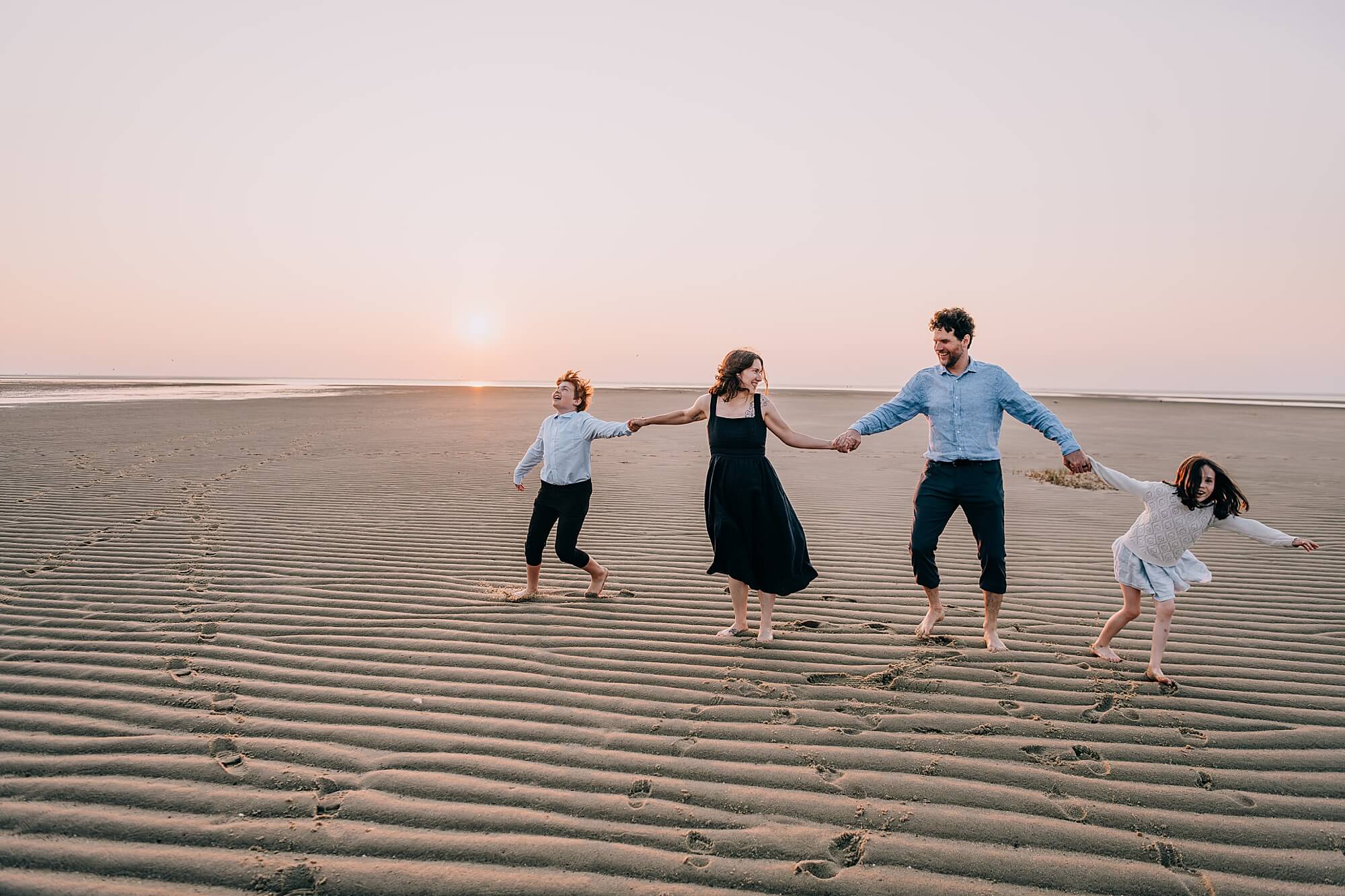 Family during a photoshoot at the brewster flats with Cape Cod Family Photographer Allison Wolf