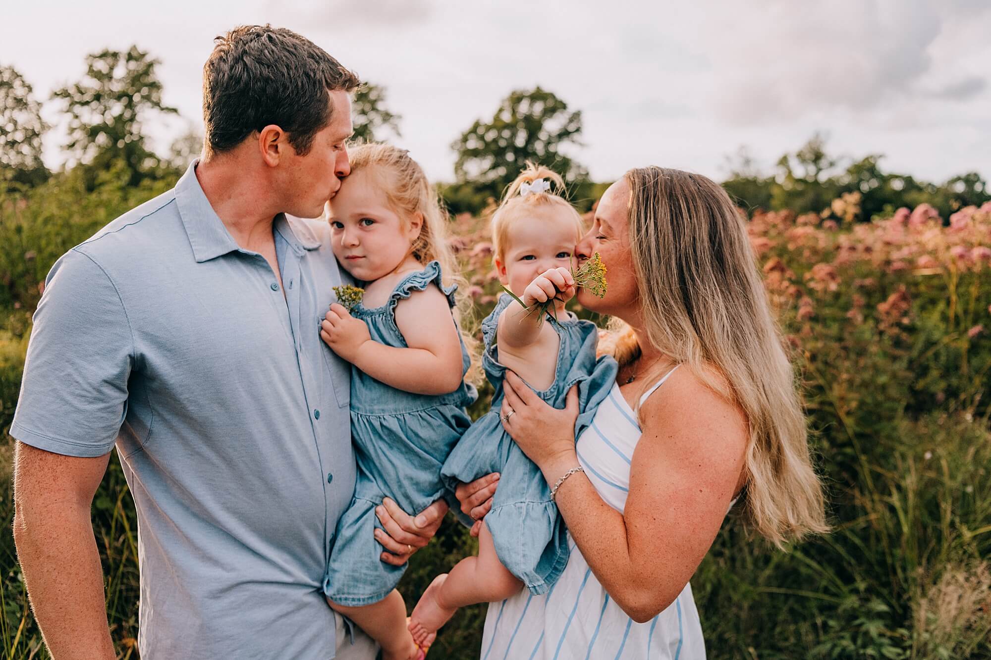 A South Shore family snuggles during their family photo session in Duxbury